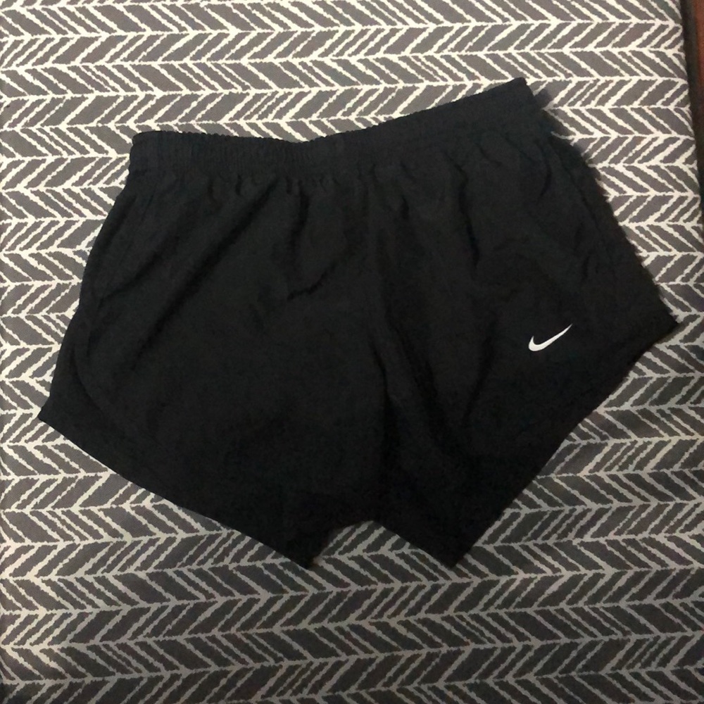 Black Nike running shorts